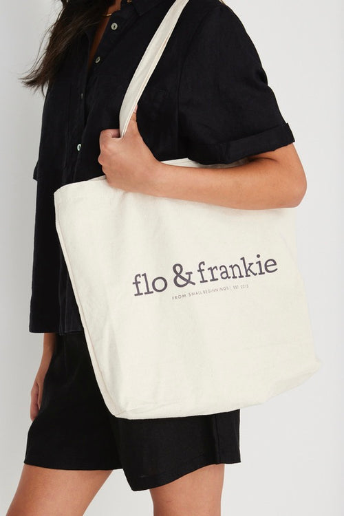 Model wears flo and frankie natural tote bag