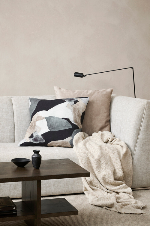 brown black and grey abstract cushion on couch