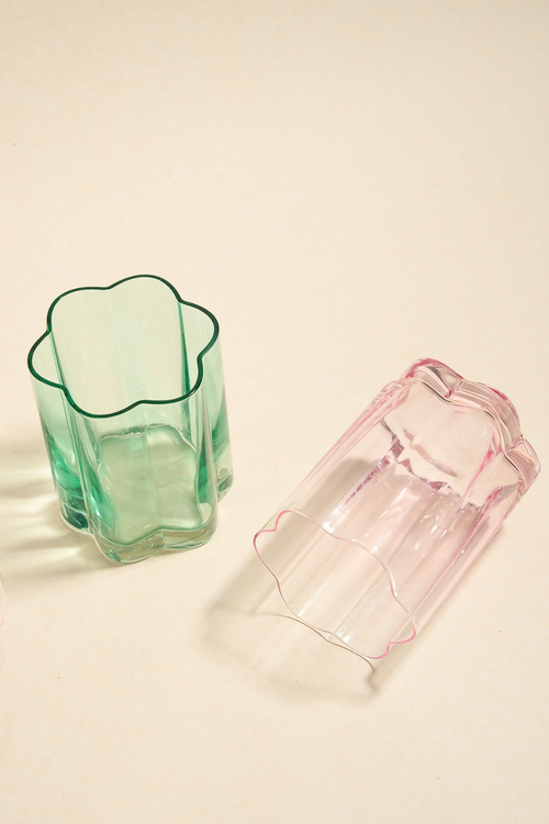 pink flower shaped glass and green flower shaped glass