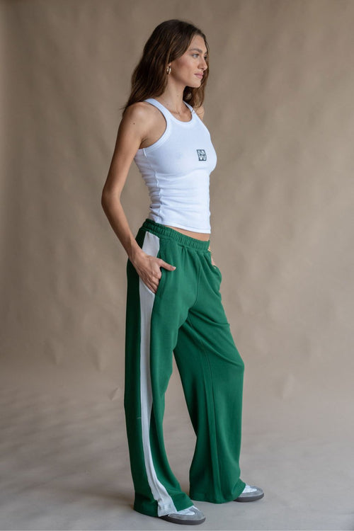 model wears a Green Track Pant