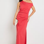 Woman wearing a bold red one-shoulder dress with flattering ruching, perfect for a glamorous night out.