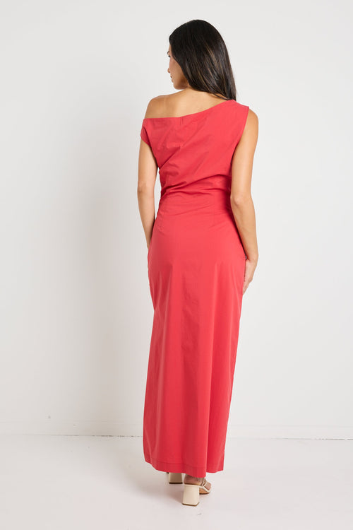 Woman wearing a bold red one-shoulder dress with flattering ruching, perfect for a glamorous night out.