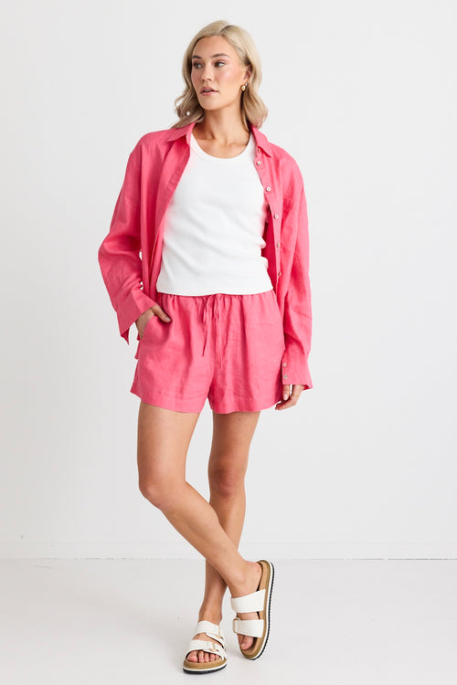 model wears a pink linen short