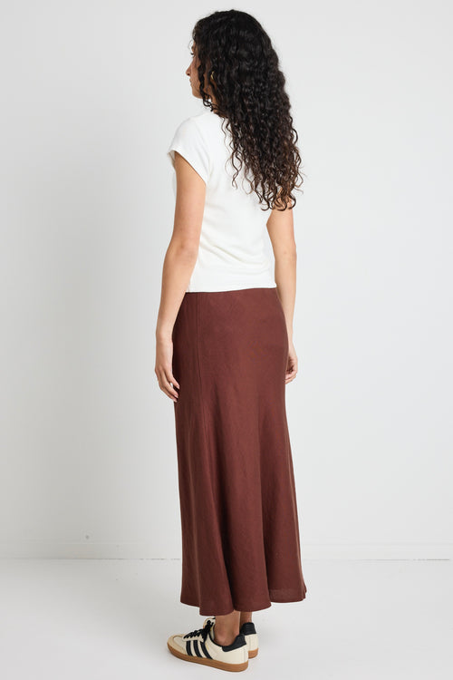 Model wears a linen tie waist maxi skirt