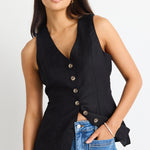 model wears black linen vest