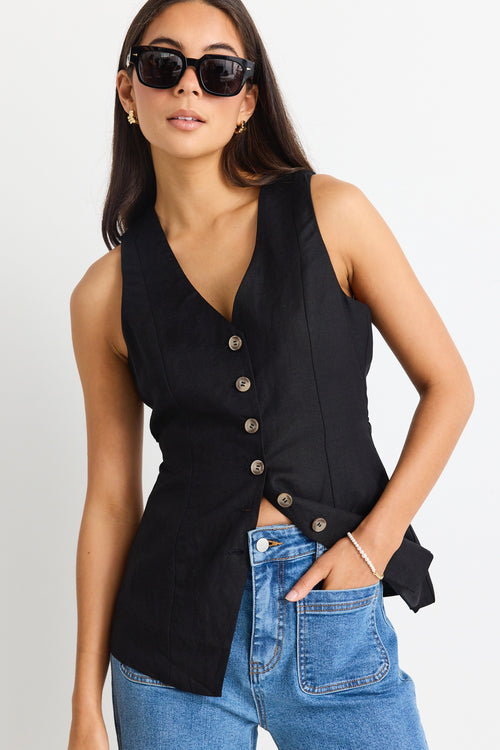 model wears black linen vest