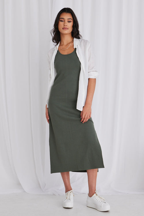 model wears a khaki rib dress with white shirt