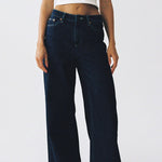 model wears blue wide leg jean