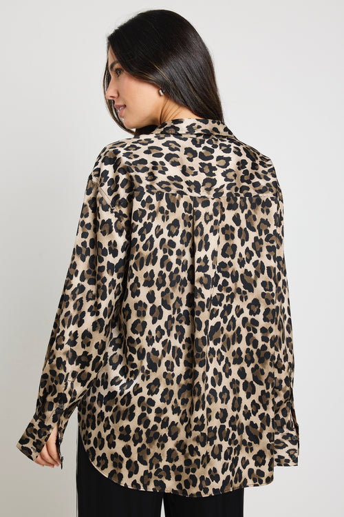 model wears a leopard print satin shirt with black satin pants