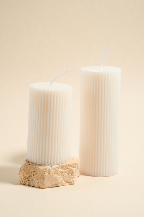 white ribbed candles