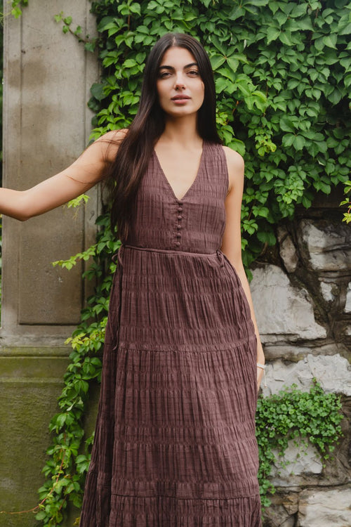 model wears a brown cotton maxi dress