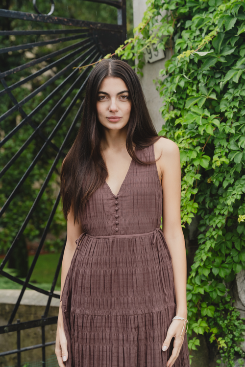 model wears a brown cotton maxi dress