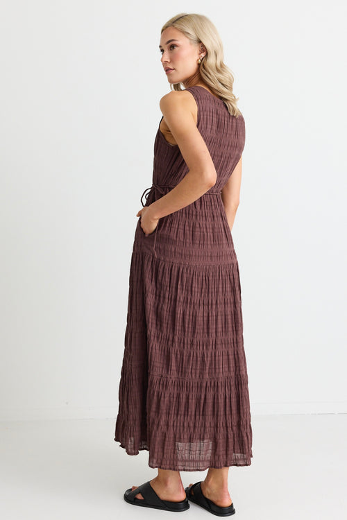 model wears a brown cotton maxi dress