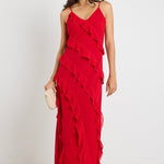 Model wears a red ruffle maxi dress 