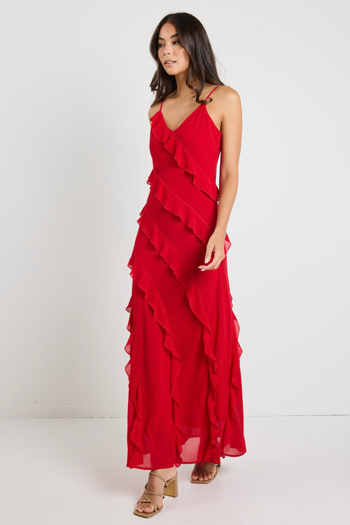 Model wears a red ruffle maxi dress 