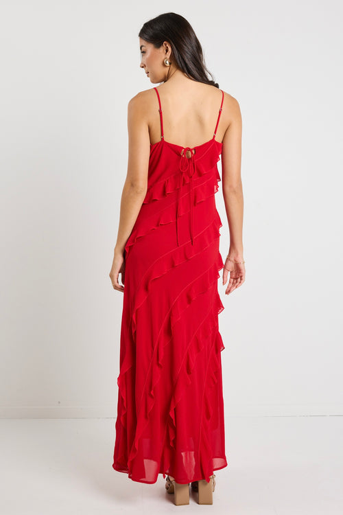 Model wears a red ruffle maxi dress 