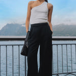 model wears black linen pants