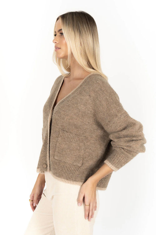 model wears a hazelnut brown beige cardigan