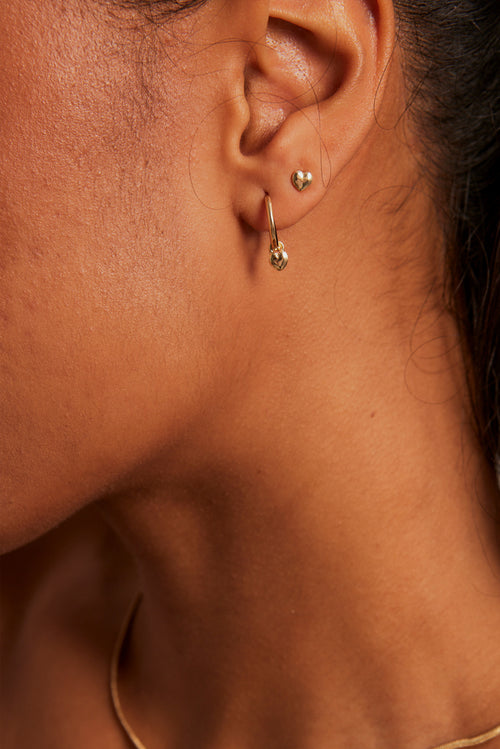 model wearing sleeper stud earring set gold