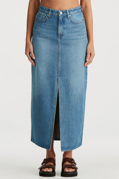 model wears blue denim maxi skirt