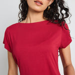 model wears a red t shirt