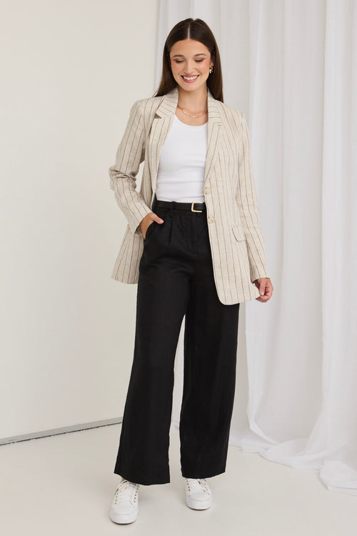 model wears a stripe beige blazer