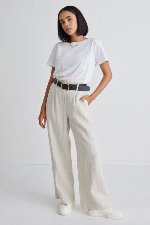 model wears a beige linen pant