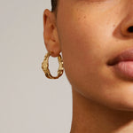 gold hoop earring