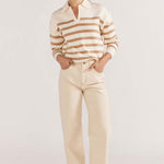 model wears a beige stripe knit