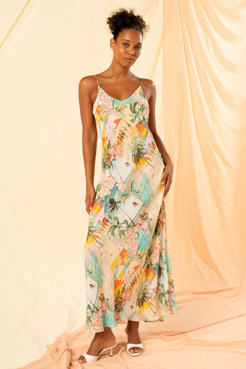 model wears a blue printed maxi dress