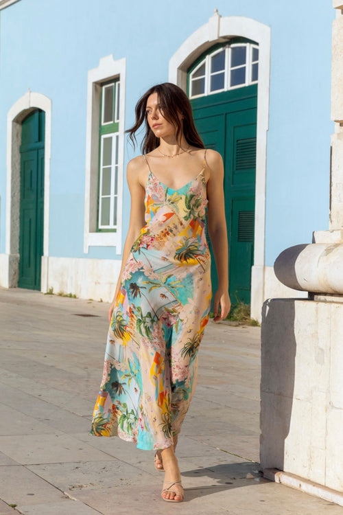 model wears a blue printed maxi dress