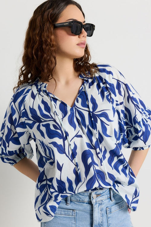 model wears Blue Floral Print Cotton Top