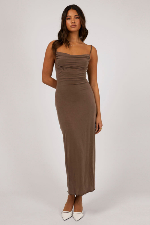 model wears brown maxi dress