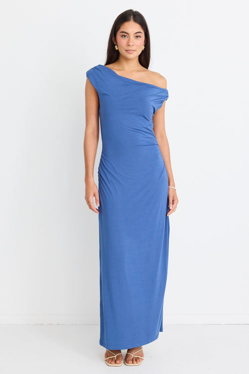 model wears blue off the shoulder maxi dress