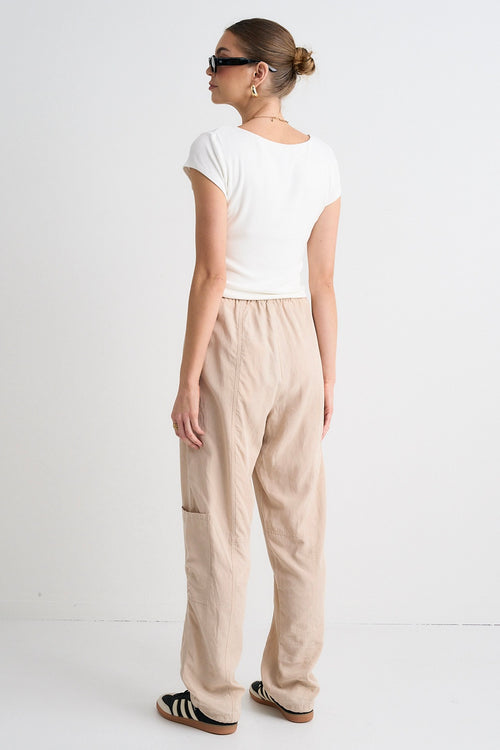 model wears Beige Cargo Pants