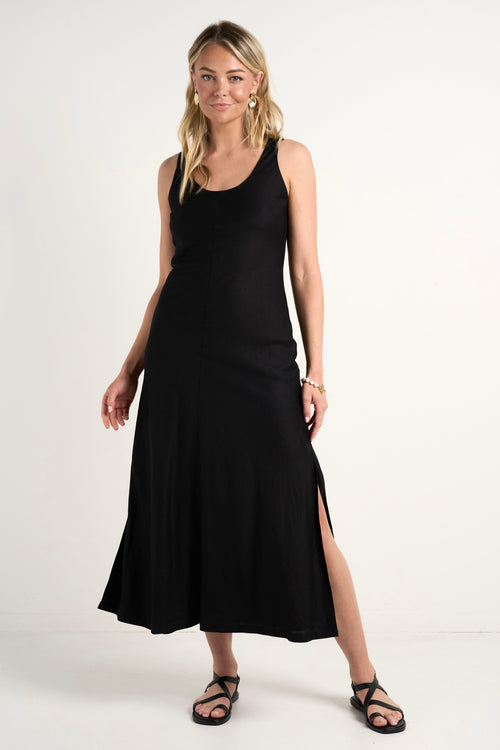  model wears a black linen midi dress