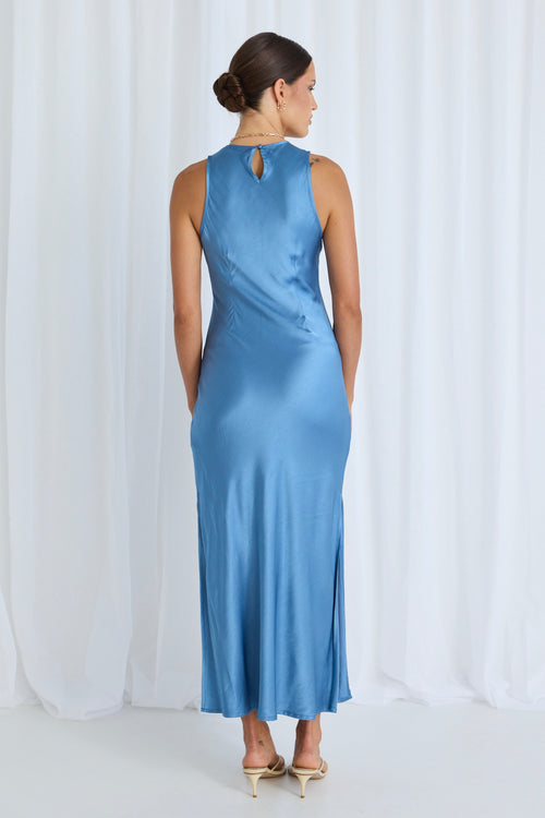 Model wears a blue satin dress