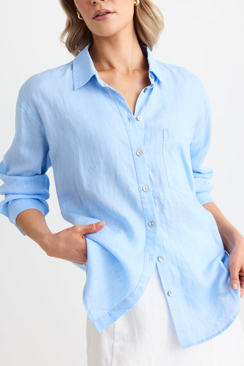 model wears blue oversized shirt