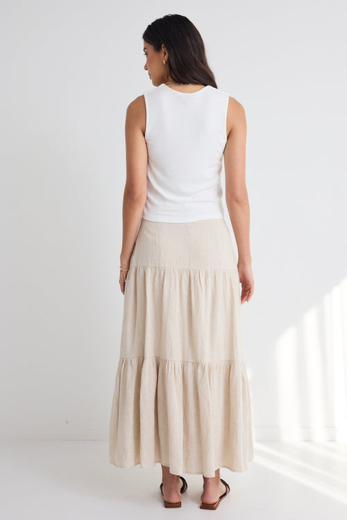 model wears a beige linen skirt