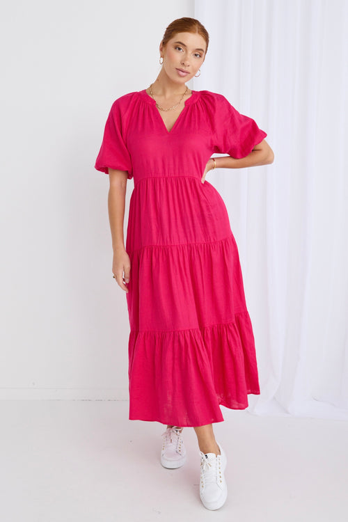 model wears a pink maxi dress