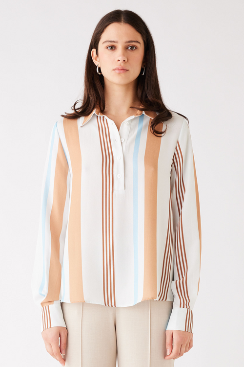 model wears blue, white and brown stripe long sleeve button up shirt