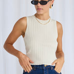 model wears a beige rib knit top