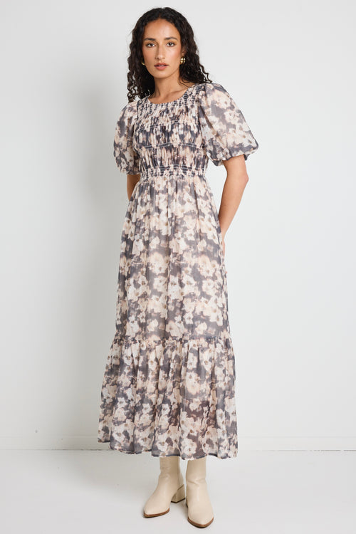 Model wears floral maxi dress