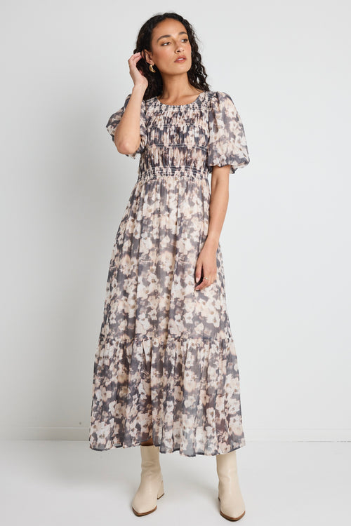 Model wears floral maxi dress