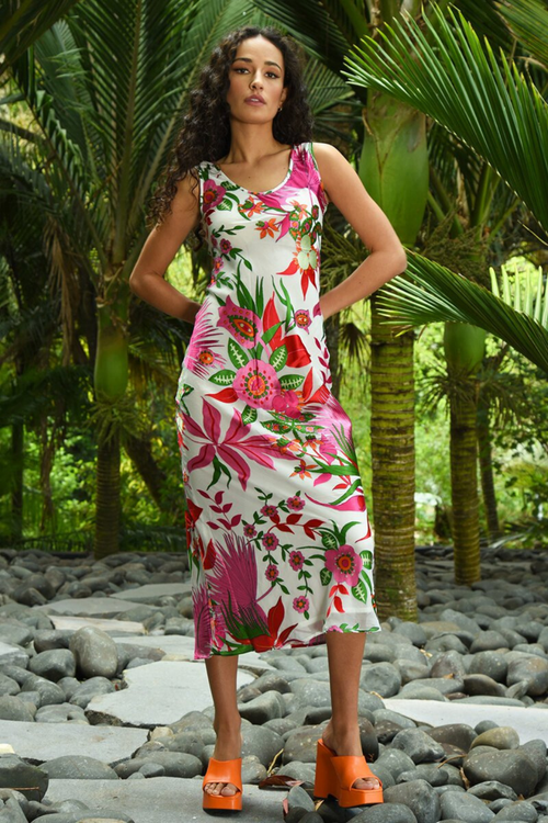 model wears pink floral midi dress