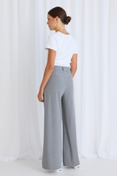 model wears a grey pant