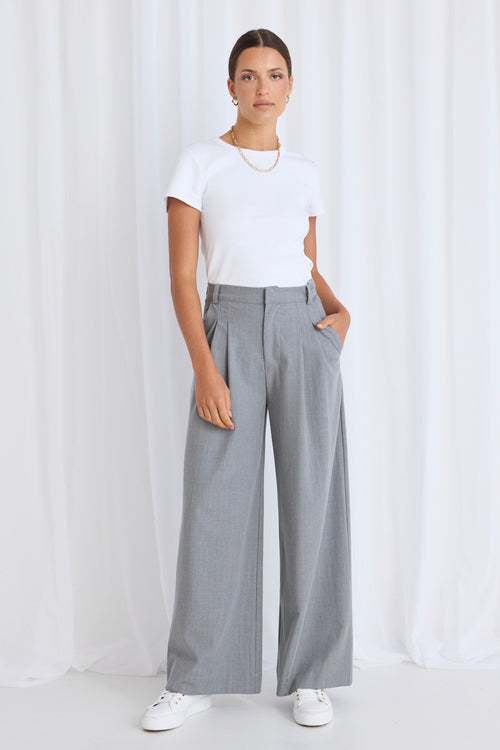 model wears a grey pant