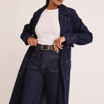 model wears a Blue Denim Trench Coat