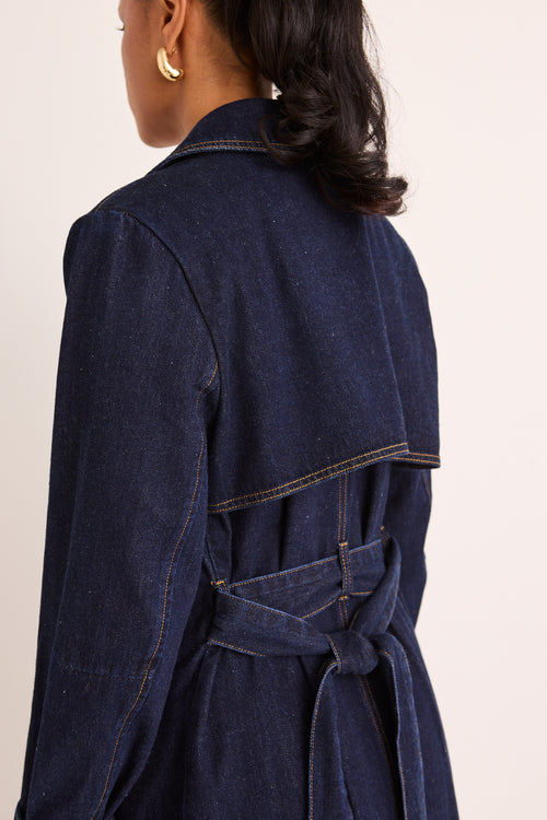 model wears a Blue Denim Trench Coat