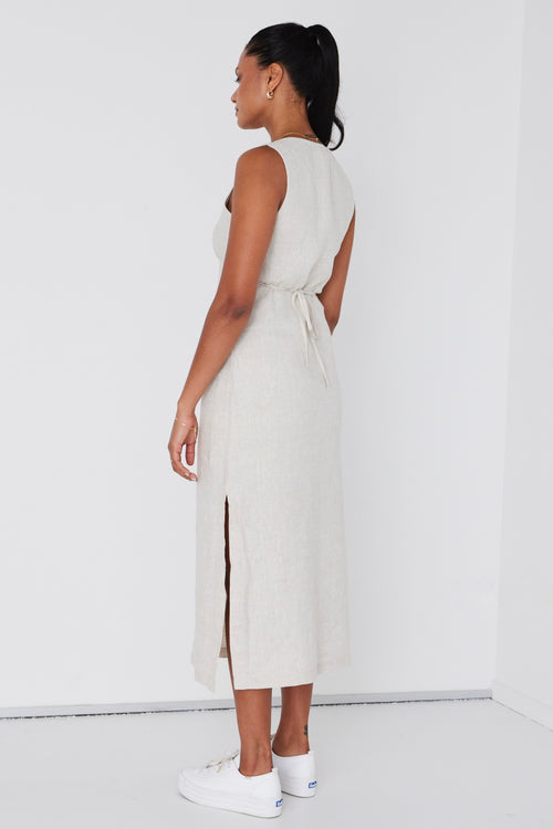 model wears linen v neck midi dress